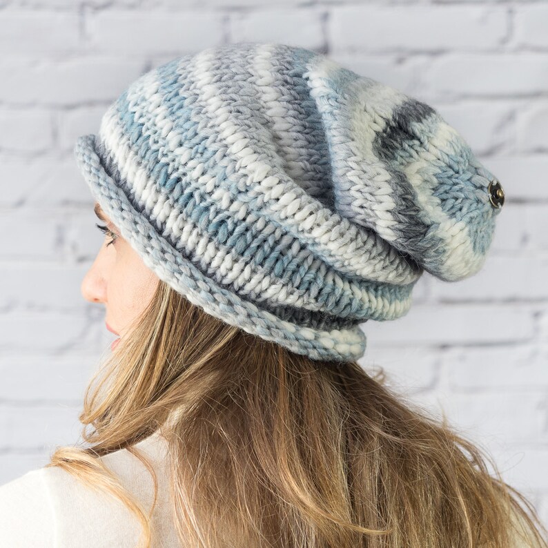 Chunky knitted blue hat with pompom Winter accessories for women