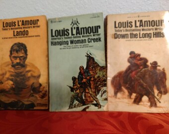 Try Westerns and a little piece of Americana. Lot of 3 Louis LAmour Paperbacks by Bantam Books printed in the 60's and 70's