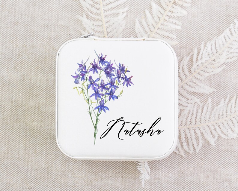 a tin with a picture of a bunch of flowers on it