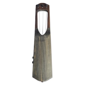 May include: A wooden lyre with four strings, a dark brown finish, and a carved wooden soundboard.