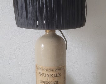 sandstone lamp with black raffia shade