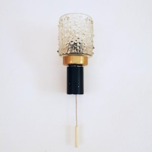 Vintage mid-century wall sconce in black and gold
