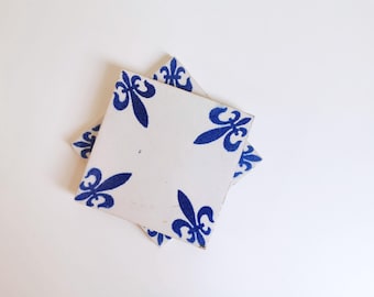 Azulejos holandeses antiguos con adornos en las esquinas