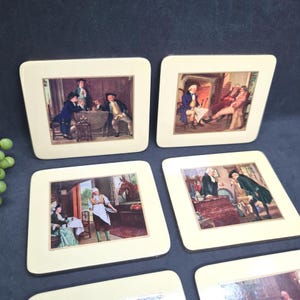 May include: A collection of square coasters with cream-coloured borders. Each coaster displays a different, detailed, colourful illustration of people in historical dress, engaged in various activities. The coasters appear to be made of a durable material.