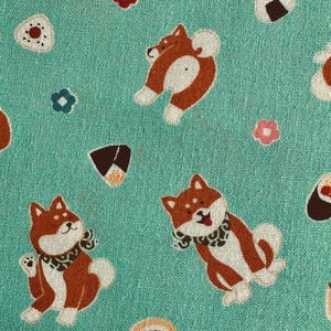 Sushi Shibas Fabric, Imported from Japan, 100% Cotton Sheeting on Aqua background, 44”, priced by Half Yard