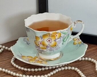 Paragon Orange Blossom Tea Cup and Saucer Blue 1 Signed Reg Johnson