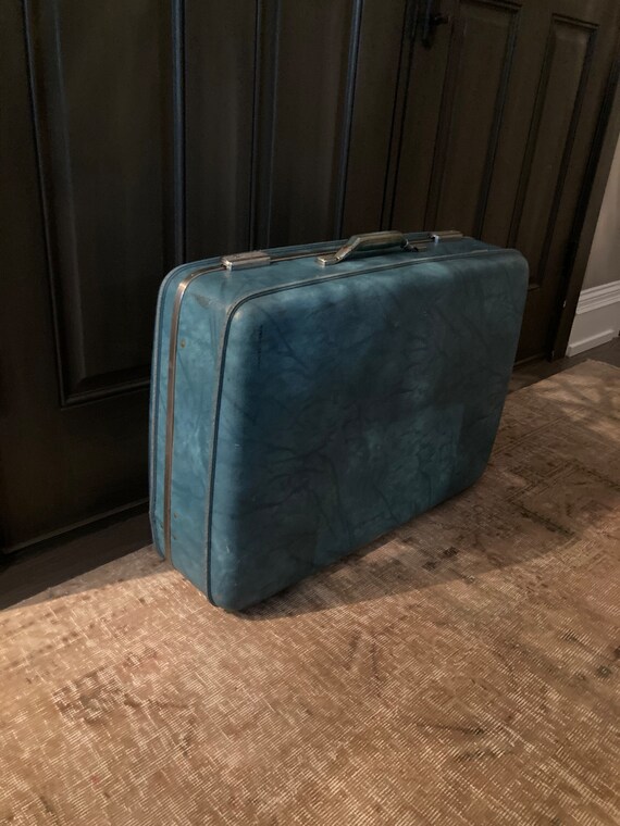 The Big Blue Suitcase - image 8