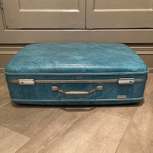 The Big Blue Suitcase