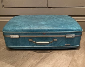 The Big Blue Suitcase