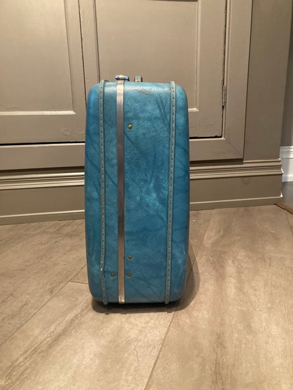 The Big Blue Suitcase - image 4