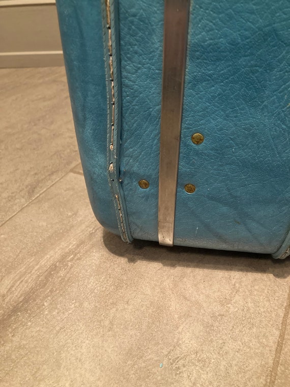 The Big Blue Suitcase - image 9