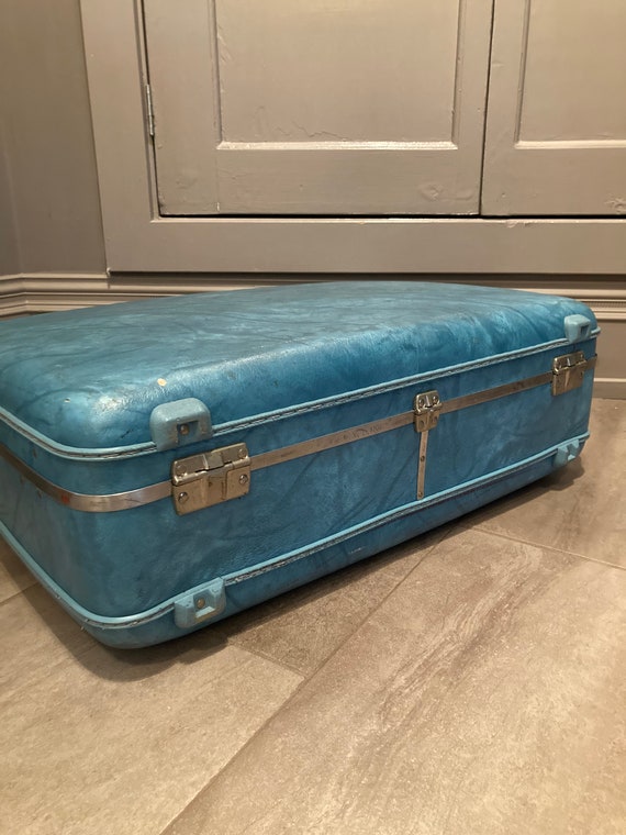 The Big Blue Suitcase - image 5