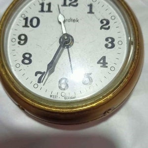 Vintage Nordtek Wecker West Germany Alarm Clock, Small Manual Wind Up Clock, Wall hanging Golden Clock From 1950s