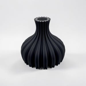 The Eclipse Bloom Sculptural Watertight Vase in Matte Black