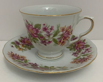 Made in China Teacup and Saucer, Pink, Yellow Flowers, Green Leaves,  Gold Trim,