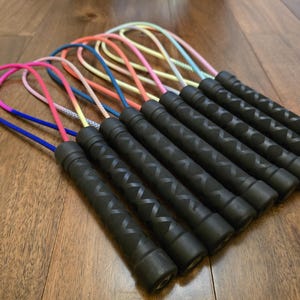 Paracord loop paddle – spring core, metal handle, handmade uk