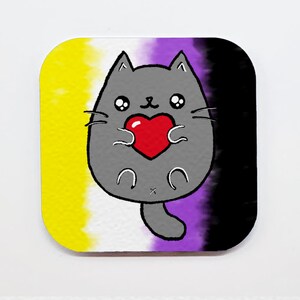 May include: A gray cat with a heart in its paws, on a background of yellow, white, purple, and black colors. The cat is holding a red heart in its paws.