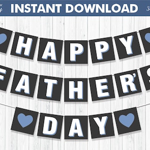 May include: Happy Father's Day banner with black and white letters and blue hearts. The banner is strung on a white background.