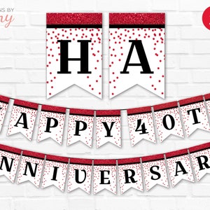 May include: Red and white banner with the text "Happy 40th Anniversary" in black letters. The banner has a red glitter trim and red confetti on a white background.
