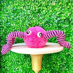 Roze pluche harige spin