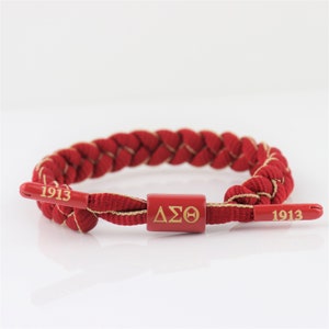 Bracelet en paracorde Delta Sigma Theta Sorority avec centre de table en lettres grecques DST et couvre-lacets en relief de l'année de fondation 1913. Cadeau parfait !