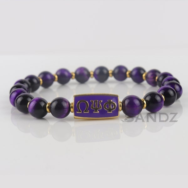 Omega Psi Phi Fraternity Stretch Bead Bracelet : ΩΨΦ center bead paired with Gold tone & Purple Tiger Eye agates beads.