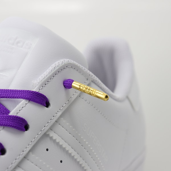 Omega Psi Phi polyester sneaker laces. Metal aglet with embossed Omega Psi Phi Greek letters. 3 options: Flat, Round, Camouflage