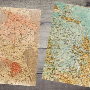 Peut inclure: Deux cartes anciennes, l'une montrant une r&eacute;gion de Russie et l'autre montrant une r&eacute;gion du monde. Les deux cartes sont dans des tons de brun, jaune et bleu.