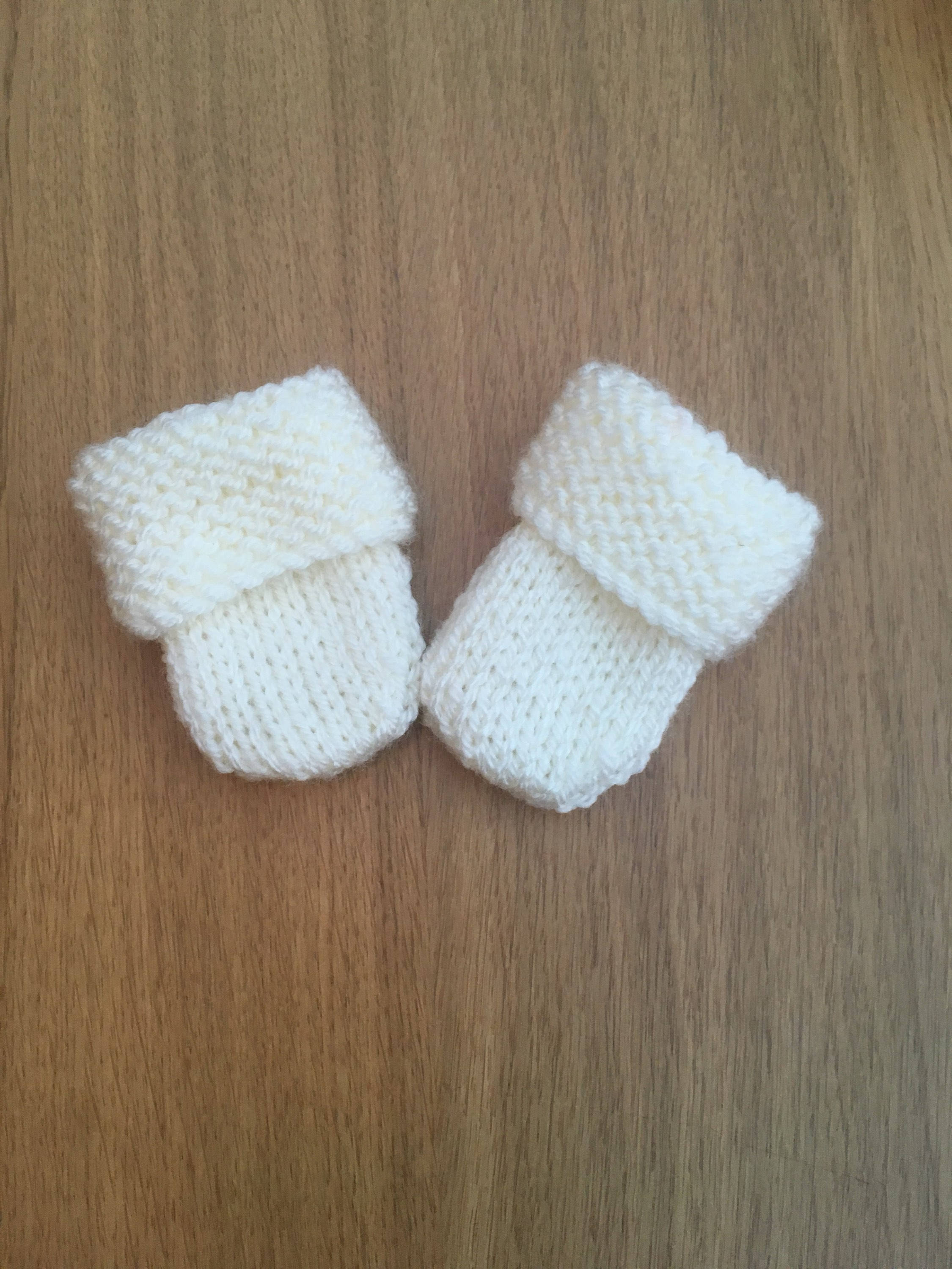 cream baby mittens