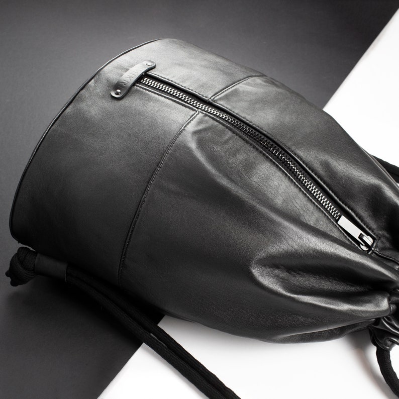 black leather drawstring backpack