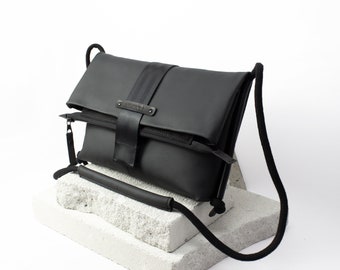 Bolso bandolera de diseño, bolso de transporte diario de cuero reciclado negro, bolso plegable con asa de cuerda, ajustable en dos posiciones