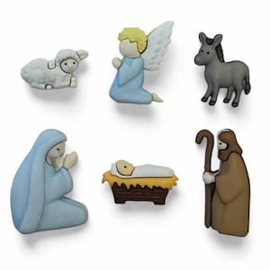 May include: A set of seven colorful plastic figurines depicting the Nativity scene. The set includes a baby Jesus in a manger, Mary, Joseph, an angel, a sheep, and a donkey.