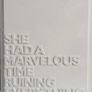 May include: White textured canvas art featuring the phrase "SHE HAD A MARVELOUS TIME RUINING EVERYTHING" in raised, block letters. The artwork has a minimalist aesthetic and a modern design.