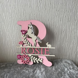 Placa personalizada con el nombre de los niños.