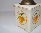 Mini porcelain grinding mill - painted floral figure - good general condition