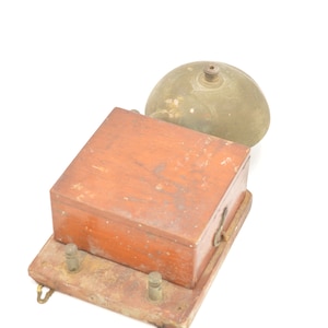 Old chime doorbell from vintage wood metal telephone