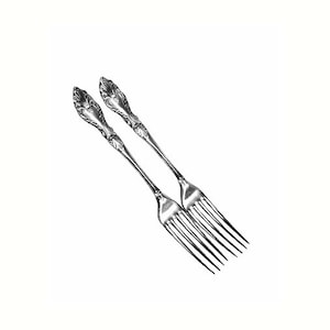 May include: Two silver forks with ornate handles.