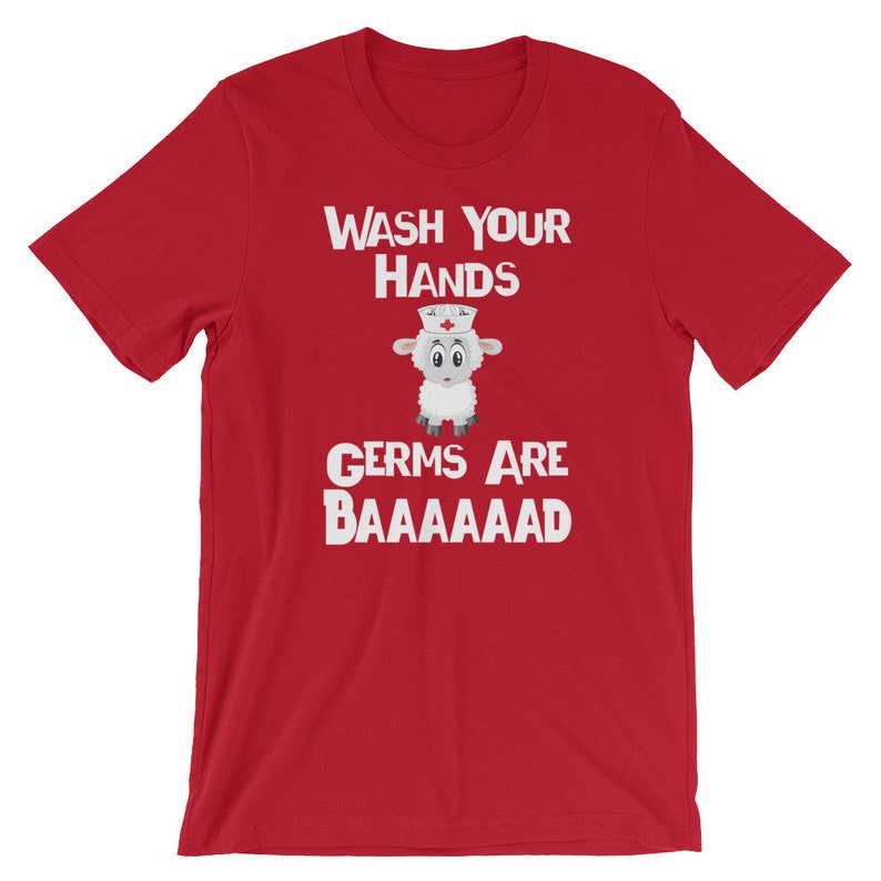 May include: Red short-sleeved t-shirt with white text that reads "Wash Your Hands" and "Germs Are Baaaaaaad". A cartoon sheep wearing a nurse's hat is in between the text.