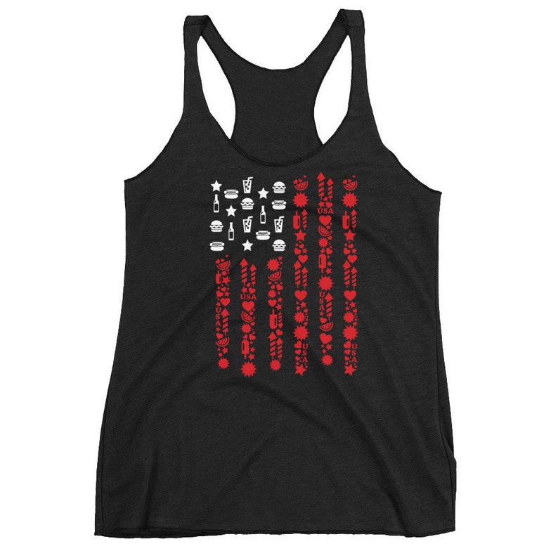May include: A black racerback tank top featuring a patriotic design. The design is a stylized American flag composed of red and white icons, including stars, hearts, fireworks, and food items. The tank top is made of a soft, comfortable material.