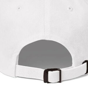May include: White baseball cap with an adjustable strap and buckle closure. The back of the cap is blank.