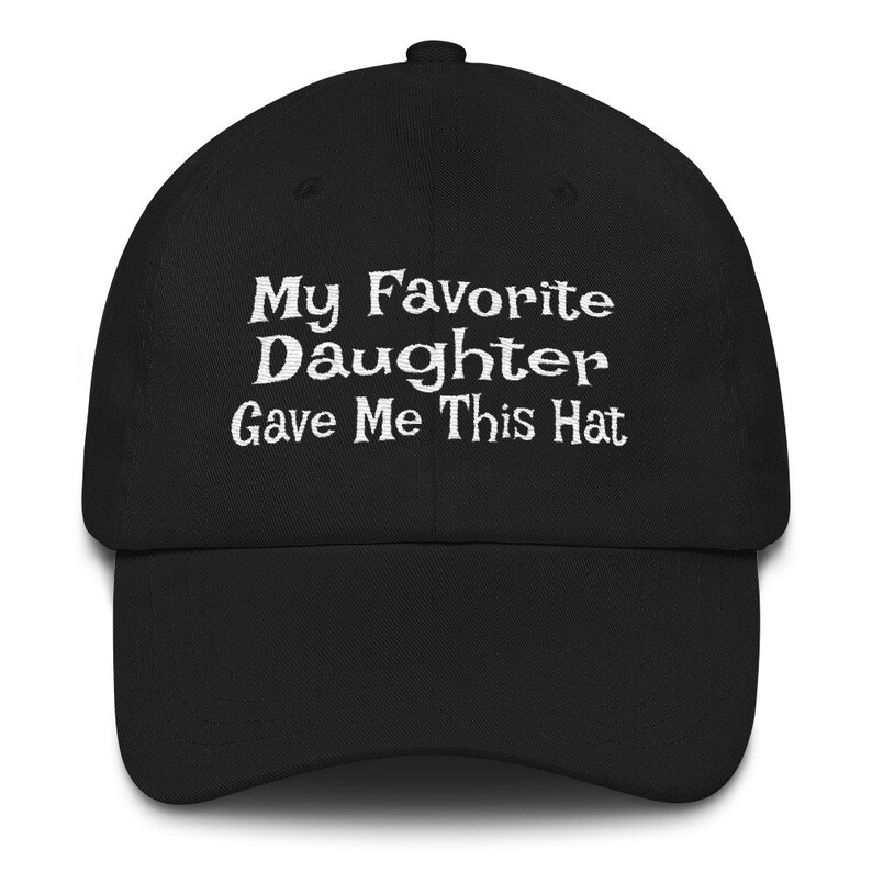 May include: Black baseball cap with white embroidered text that reads "My Favourite Daughter Gave Me This Hat"