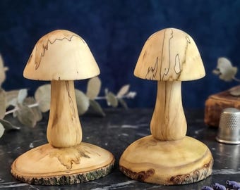 Mushrooms turned from a Buckeye tree limb