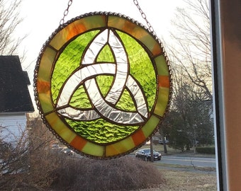 Circle with irish design in the center, handcrafted stained glass panel.