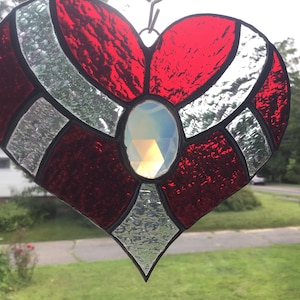 Heart with ribbon design, handcrafted stained glass suncatcher.