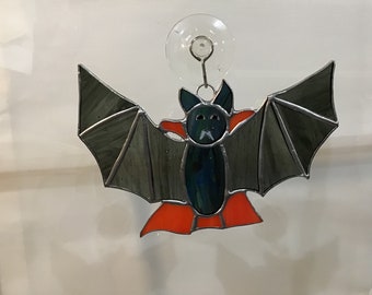 Vampire bat handcrafted stained glass suncatcher.