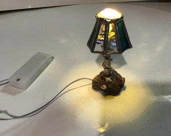 Dollhouse floor lamp on driftwood handcrafted dicroic stained glass with tiny fish in glass.