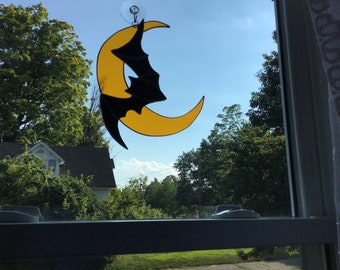 Bat flying in front of moon,handcrafted stained glass suncatcher.