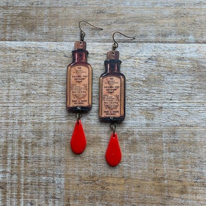 Pill Bottle Earrings Gothic Antique Bottle Earrings Blood Gothic Calomel and Rhubarb Compound Pill Oddity Clip On Earrings Ear Hangers