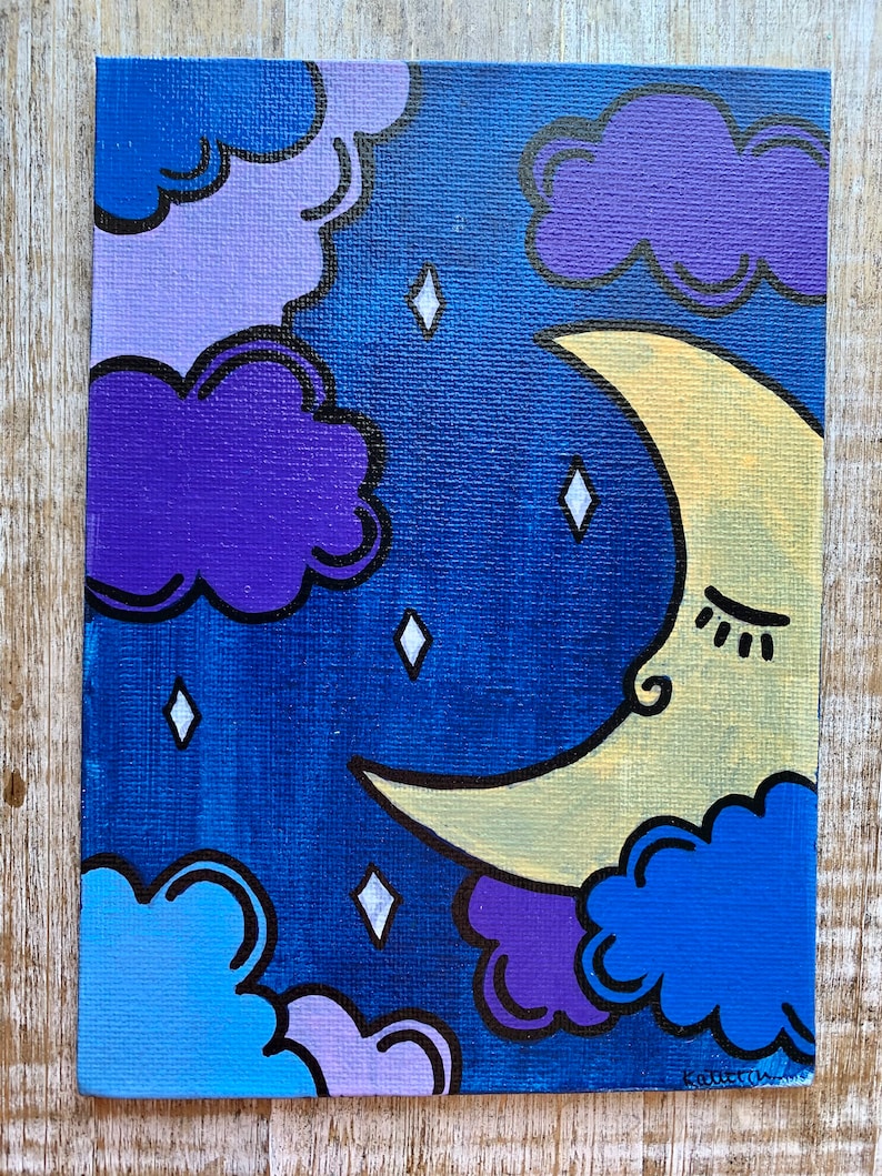 May include: A painting of a crescent moon with a sleeping face, surrounded by purple, blue, and light blue clouds. The background is a dark blue with white diamond-shaped stars.