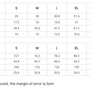 Puede incluir: Una tabla de tallas de ropa con medidas en pulgadas y cent&iacute;metros. Las tallas van de XS a 4XL, con medidas de largo, hombro, busto y manga. El texto en la parte inferior dice: 'La tabla de tallas se mide manualmente, el margen de error es de 5 cm.'